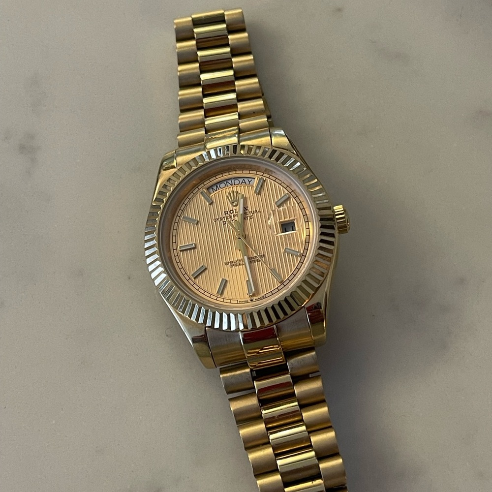 Rolex Gold Watch with Day-Date Display
